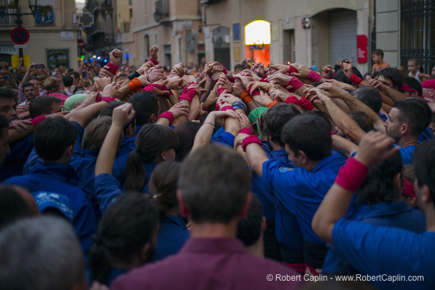 Castellers building human towers in Gracia, Barcelona.  Photo by Robert Caplin