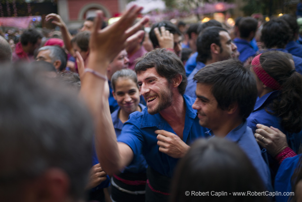 Castellers building human towers in Gracia, Barcelona.  Photo by Robert Caplin